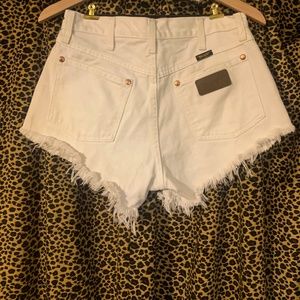 White Wrangler cutoff shorts
